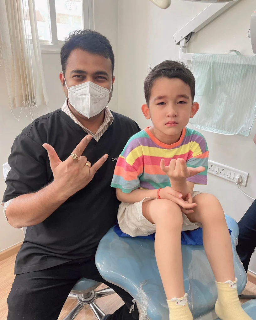 Happy child patient after dental treatment