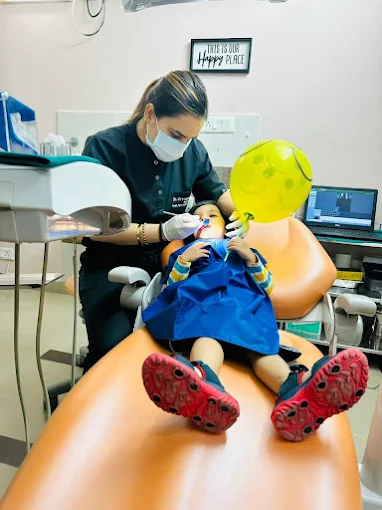 Happy child at pediatric dentist